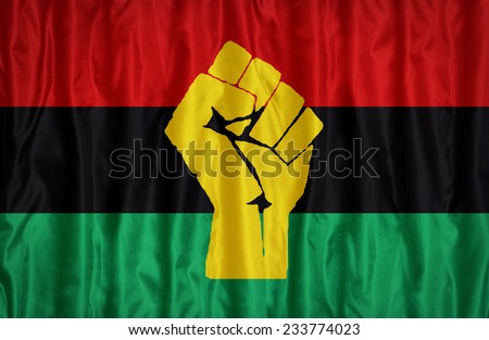 stock-photo--pan-african-resistance-and-solidarity-flag-pattern-on-the-fabric-texture-vintage-style-233774023.jpg