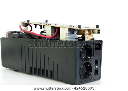 Dismantling and repair of a uninterruptible power supply - stock photo