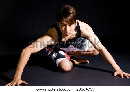 Stock Photo Asian Handsome Guy In Casual Wear Crawling 20664739