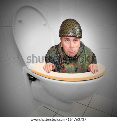 stock-photo-cowardly-soldier-hiding-in-the-toilet-bowl-funny-picture-from-army-164763737.jpg