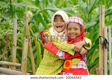 Happy Muslim kids - stock photo