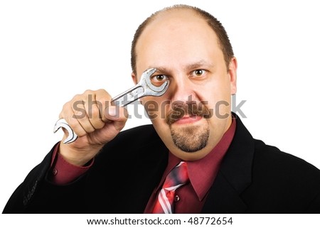 Businessman looking through a big wrench, isolated on white - stock photo - stock-photo-businessman-looking-through-a-big-wrench-isolated-on-white-48772654