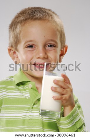 Happy boy holding a glass of milk,happy child holding a glass of milk, - stock-photo-happy-boy-holding-a-glass-of-milk-happy-child-holding-a-glass-of-milk-little-kid-drinking-milk-kid-38096461