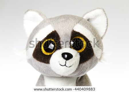 cuddly raccoon toy