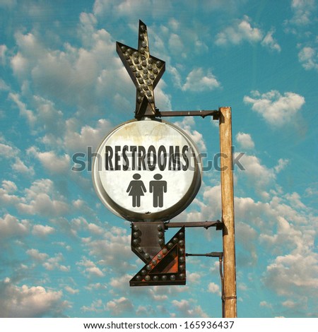 Vintage porcelain women restroom sign