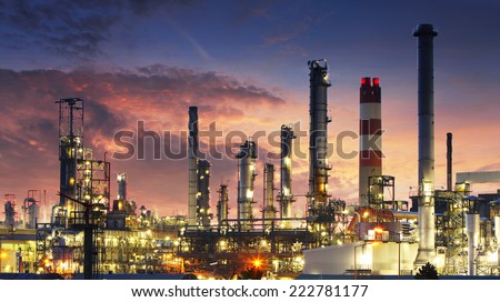 Oil refinery at night - stock photo