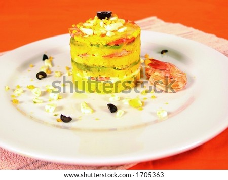 Peruvian causa limena dish with potato, egg and shrimp - stock photo Peruvian causa limena dish with potato, egg and shrimp - stock photo