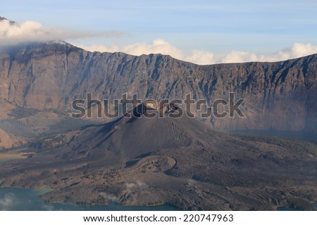 Download this Active Volcano Inside The Crater Lake Mount Rinjani Stock Photo picture