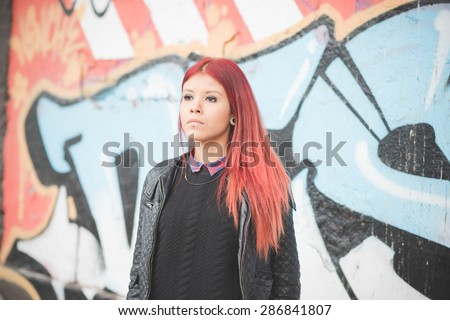 http://thumb101.shutterstock.com/display_pic_with_logo/598642/286841807/stock-photo-young-beautiful-red-hair-venezuelan-woman-lifestyle-in-the-city-of-milan-outdoor-street-286841807.jpg