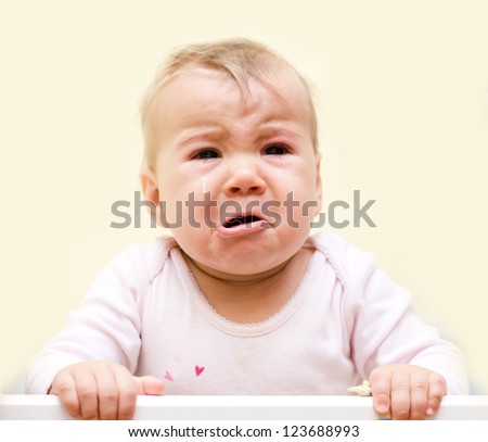 stock-photo-portrait-of-crying-baby-girl