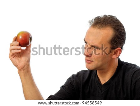 stock-photo-caucasian-man-holding-an-apple-over-white-94558549.jpg