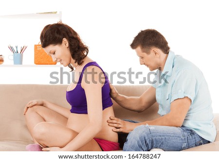 http://thumb101.shutterstock.com/display_pic_with_logo/64260/164788247/stock-photo-health-pregnancy-and-happy-people-concept-husband-giving-his-wife-back-massage-at-home-164788247.jpg