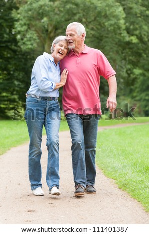 http://thumb101.shutterstock.com/display_pic_with_logo/64588/111401387/stock-photo-active-and-happy-senior-couple-walking-in-the-park-111401387.jpg