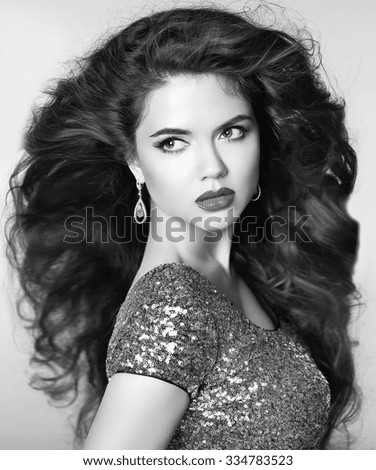 http://thumb101.shutterstock.com/display_pic_with_logo/662170/334783523/stock-photo-beautiful-elegant-girl-model-with-jewelry-makeup-and-long-wavy-hair-styling-black-and-white-334783523.jpg