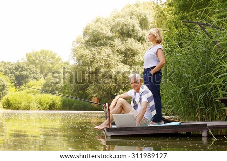 Woman Fishing Stock Photos Images Pictures Shutterstock