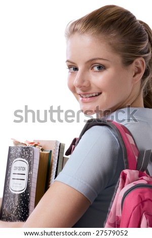 Friendly Caucasian High school girl student standing with backpack and holding books, notebooks and composition - stock-photo-friendly-caucasian-high-school-girl-student-standing-with-backpack-and-holding-books-notebooks-and-27579052