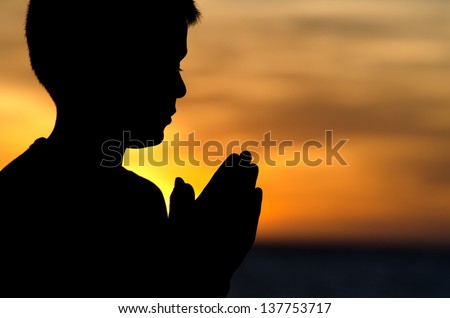 People Praying Stock Photos, Images, & Pictures 