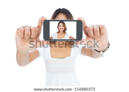 stock-photo-happy-asian-woman-taking-a-selfie-using-her-smartphone-156880373.jpg