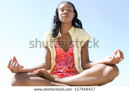 http://thumb101.shutterstock.com/display_pic_with_logo/840583/127468427/stock-photo-close-up-low-view-of-a-healthy-and-attractive-african-american-woman-in-a-yoga-position-meditating-127468427.jpg