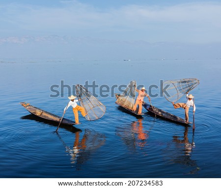  boats at Inle lake in Myanmar famous for their distinctive one legged