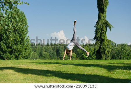 Cartwheel Stock Photos, Images, & Pictures 