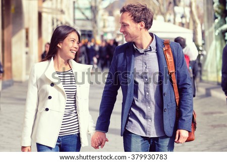 http://thumb101.shutterstock.com/display_pic_with_logo/97565/379930783/stock-photo-young-dating-couple-in-love-walking-in-city-business-people-or-office-colleagues-flirting-after-379930783.jpg