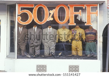 WASHINGTON DC - CIRCA 1980 s: Discounted men s clothes in storefront