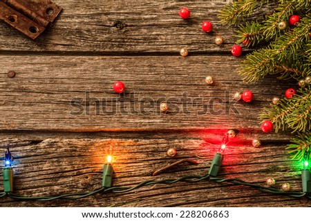 Christmas Lights on Old Rustic Wood Background and Pine Tree with Red ...