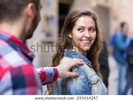 http://thumb101.shutterstock.com/display_pic_with_logo/124564/295414247/stock-photo-handsome-guy-trying-to-get-acquainted-with-russian-girl-outdoors-295414247.jpg