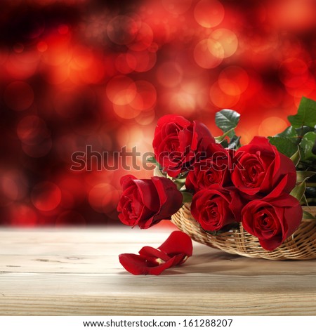 few roses and background of bokeh - stock photo