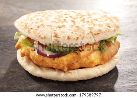 Indian style lamb shish kofta kofte Pakora naan bread burger - stock photo