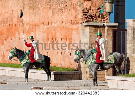 RABAT, MOROCCO - NOVEMBER 25: Royal guard in front of Hassan Tower and ...