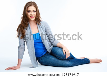 Young beautiful woman posing on white floor. Smiling female model full ...