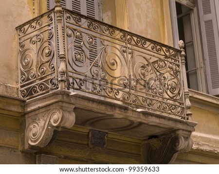 http://thumb101.shutterstock.com/display_pic_with_logo/4911/99359633/stock-photo-wrought-iron-balcony-in-athens-greece-99359633.jpg