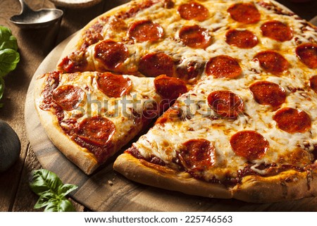 Hot Homemade Pepperoni Pizza Ready to Eat - stock photo